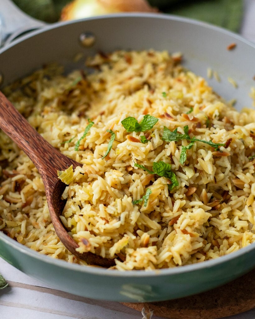 close up of vegan rice pilaf with a spoon