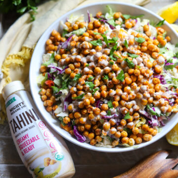 image crispy chickpeas chopped salad with creamy tahini dressing with Mighty Sesame Co package