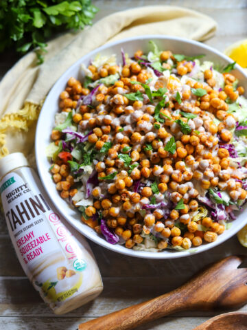 image crispy chickpeas chopped salad with creamy tahini dressing with Mighty Sesame Co package