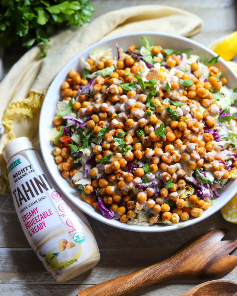 image crispy chickpeas chopped salad with creamy tahini dressing  with Mighty Sesame Co package