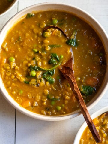 Overhead view of vegan split pea soup in a large bowl