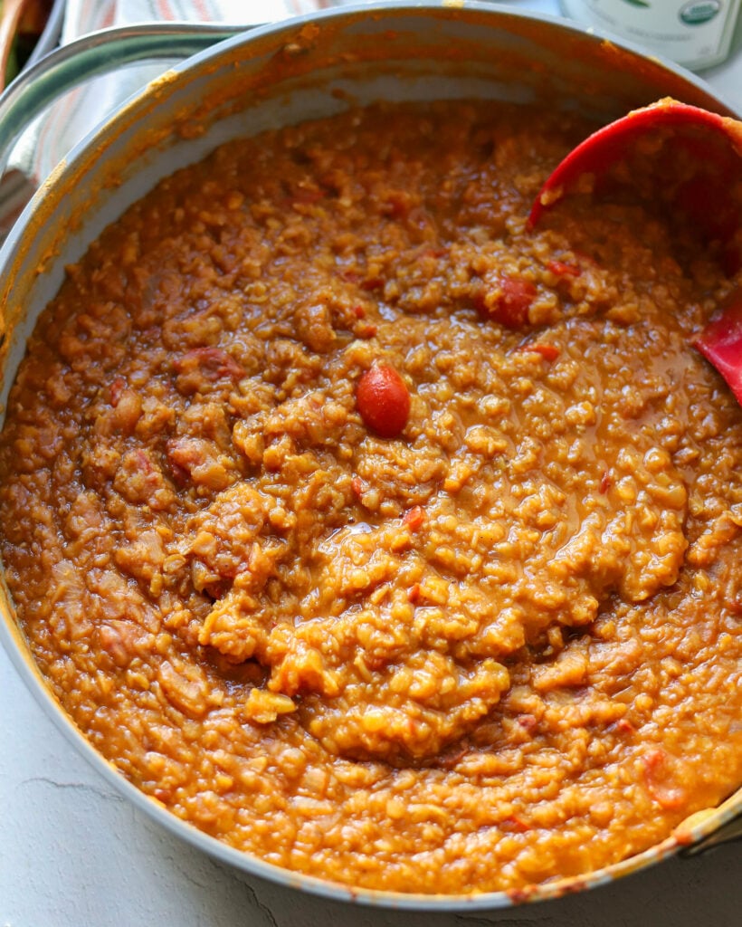 Overhead shot of a big pot of cooked red lentils