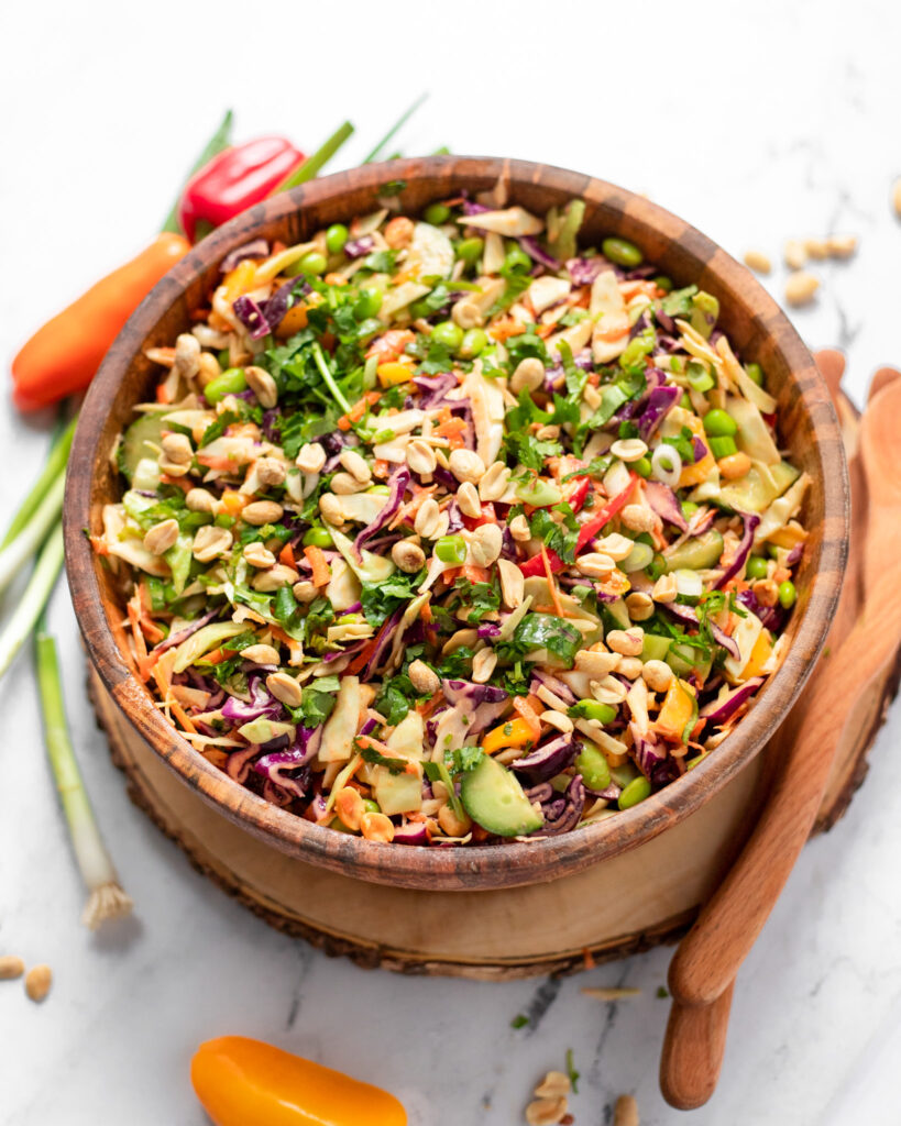  power salad with peanut sauce in a wooden bowl