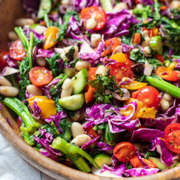 image closeup of broccoli rabe and white bean salad