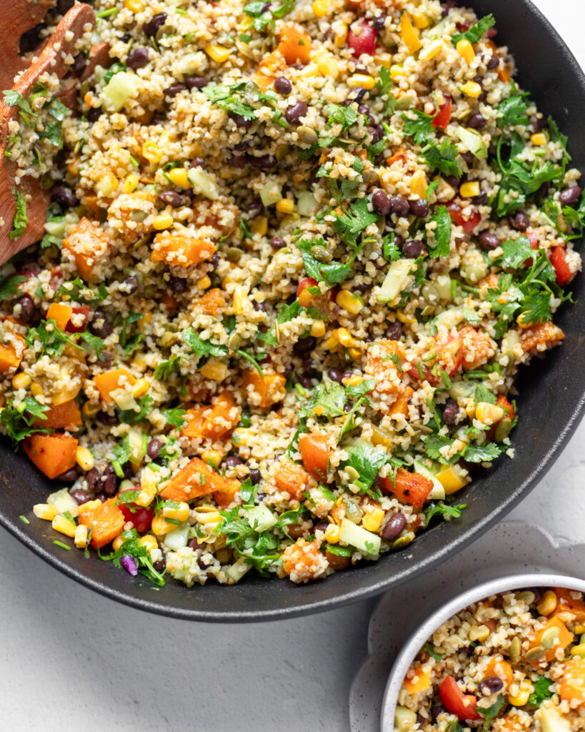 image of a colorful veggie packed grain salad