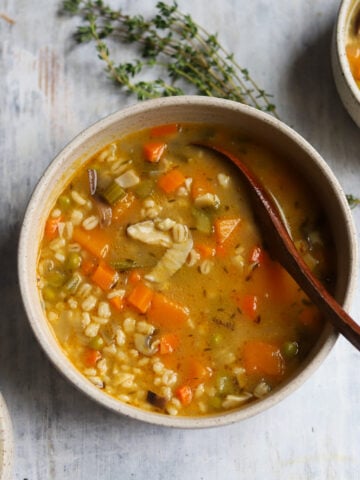 overhead view of a veggie packed mushroom barley soup