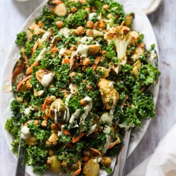 overhead view of kale salad with roasted Vega and chickpeas