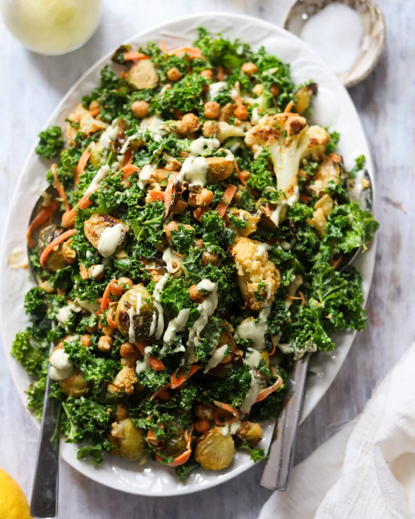 overhead view of kale salad with roasted Vega and chickpeas