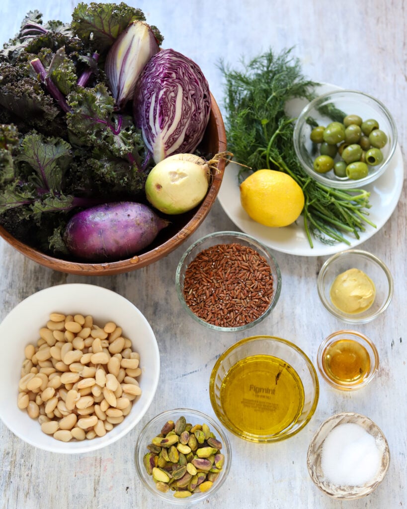 Ingredients for Kale and Rice Salad laid out in a flatly of little bowls