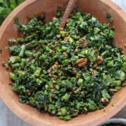 overhead view of big wooden bowl filled with chopped roasted asparagus and lentil salad.