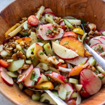 close up of summer peach sale with lentils, salad turnips, onions, nectarines and cucumbers